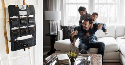 Charcoal and gray Bagby FAMILY organizer hanging in a living room