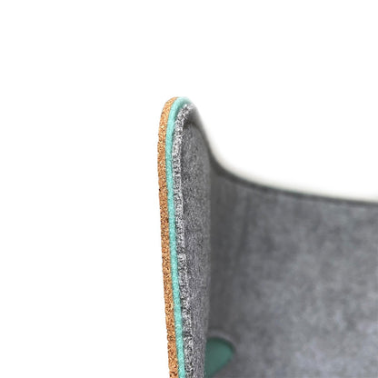 Side profile of Bagby MAT showing felt front and cork backing