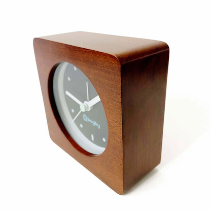 Side view of dark-wood Bagby MINIMALIST clock