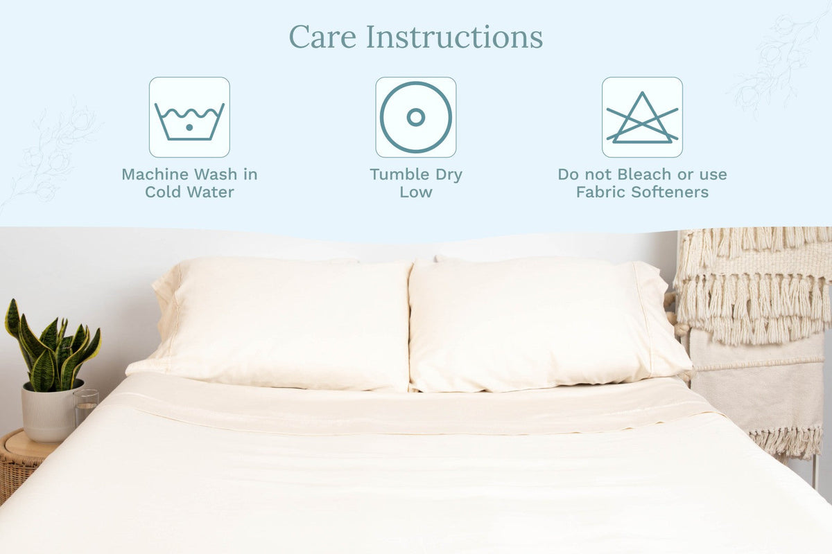 Natural Cotton sateen pillowcases on a bed beside washing-care instructions