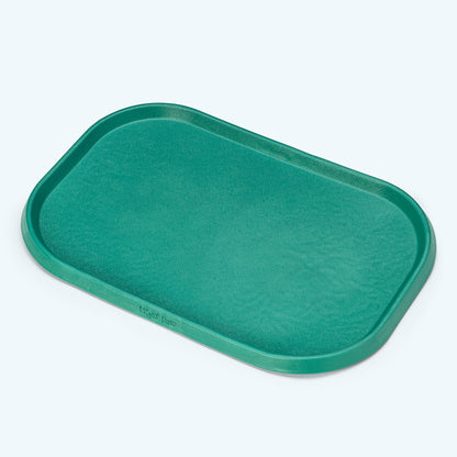 Kelp green West Paw feeding placemat with raised rim, shown alone
