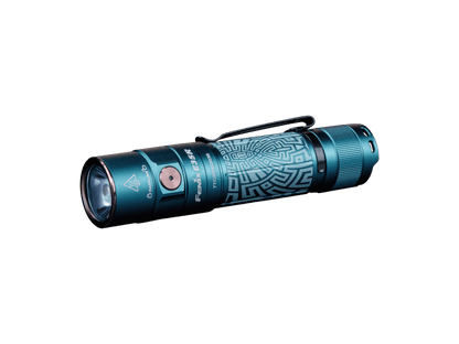 Graffiti-finish Fenix E35R flashlight showing its patterned body and side switch.
