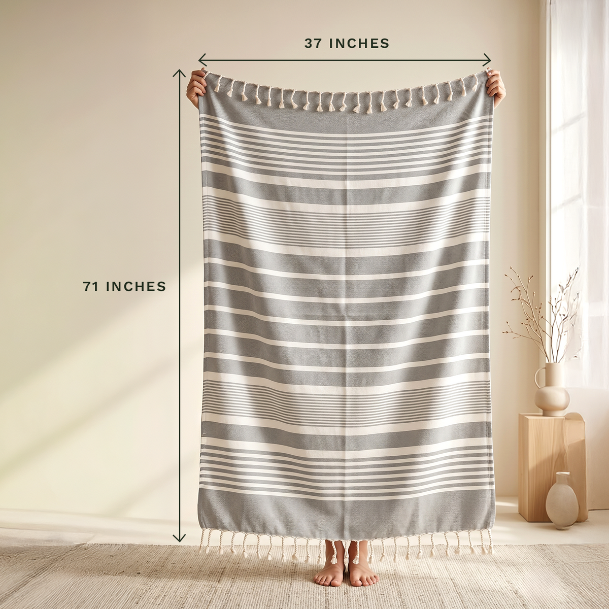 Silver Gray striped cotton towel showing approximate 71 by 37 inch dimensions; one towel is included.