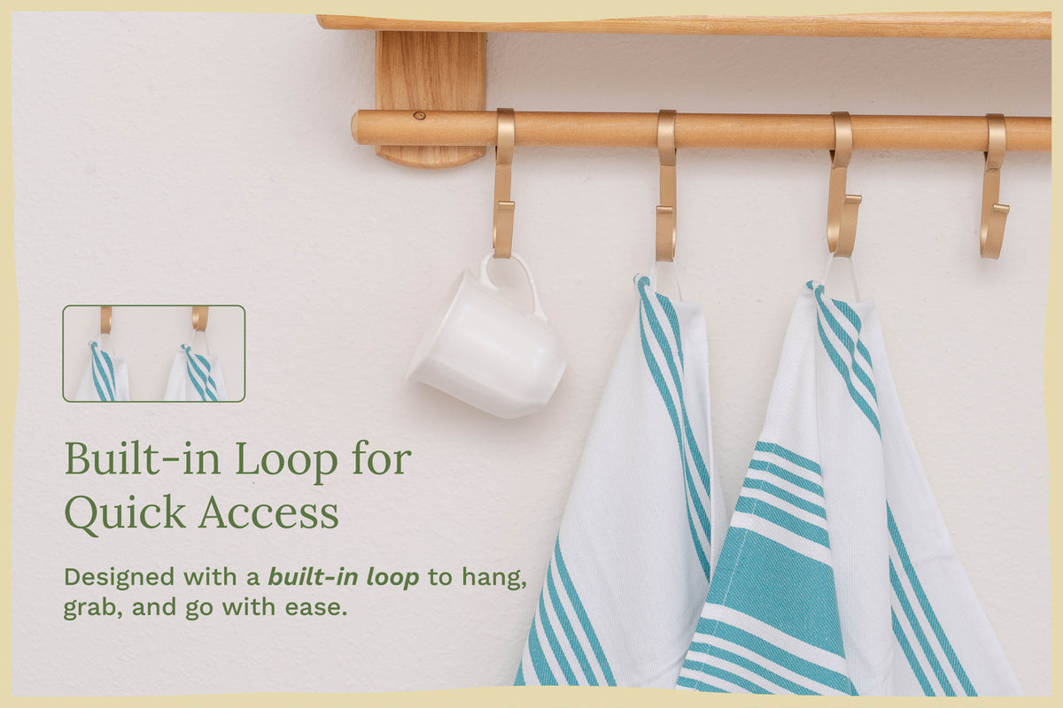Teal striped cotton kitchen towels — hanging loop detail; props not included