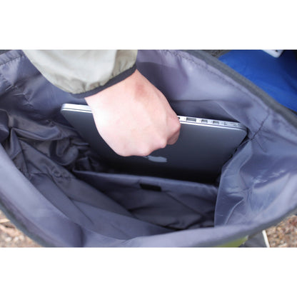 Laptop-compartment demonstration; laptop not included.