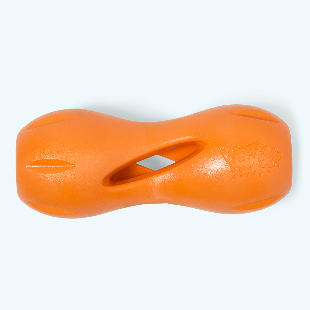 Tangerine West Paw Qwizl treat toy, shown alone.
