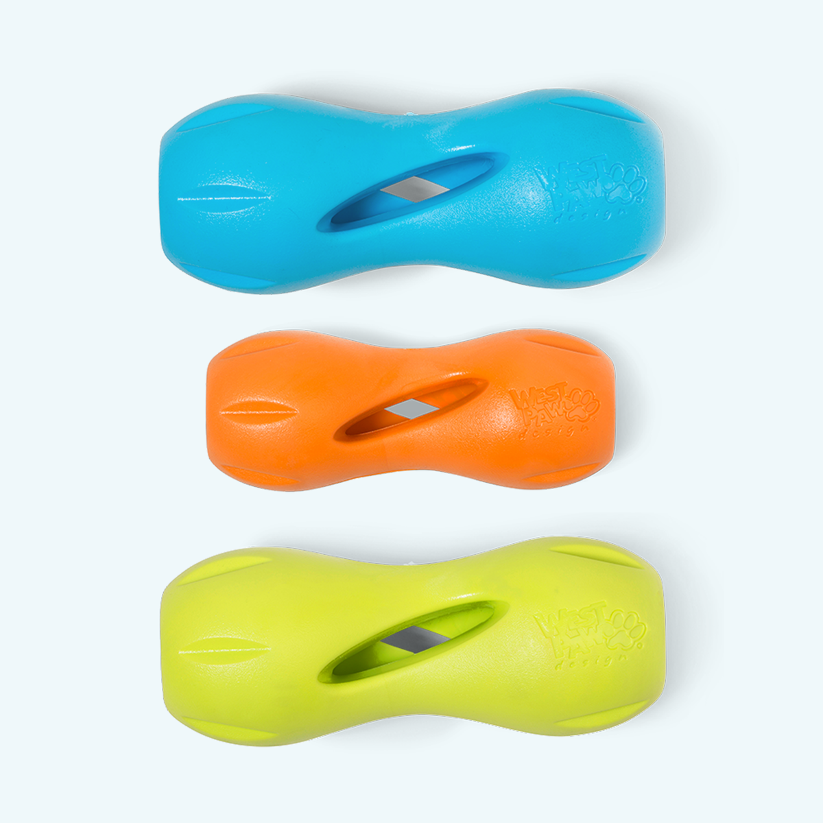 West Paw Qwizl toys in Aqua Blue, Tangerine, and Granny Smith.