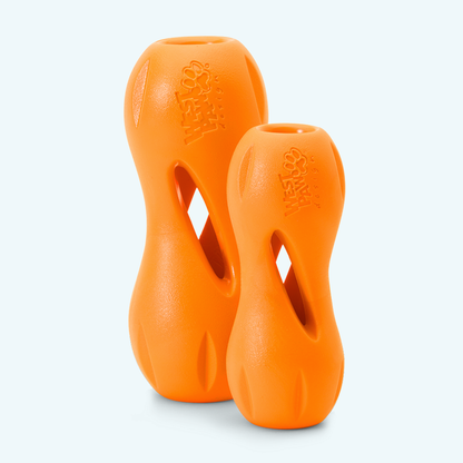 Two Tangerine West Paw Qwizl toys shown upright, with openings visible.