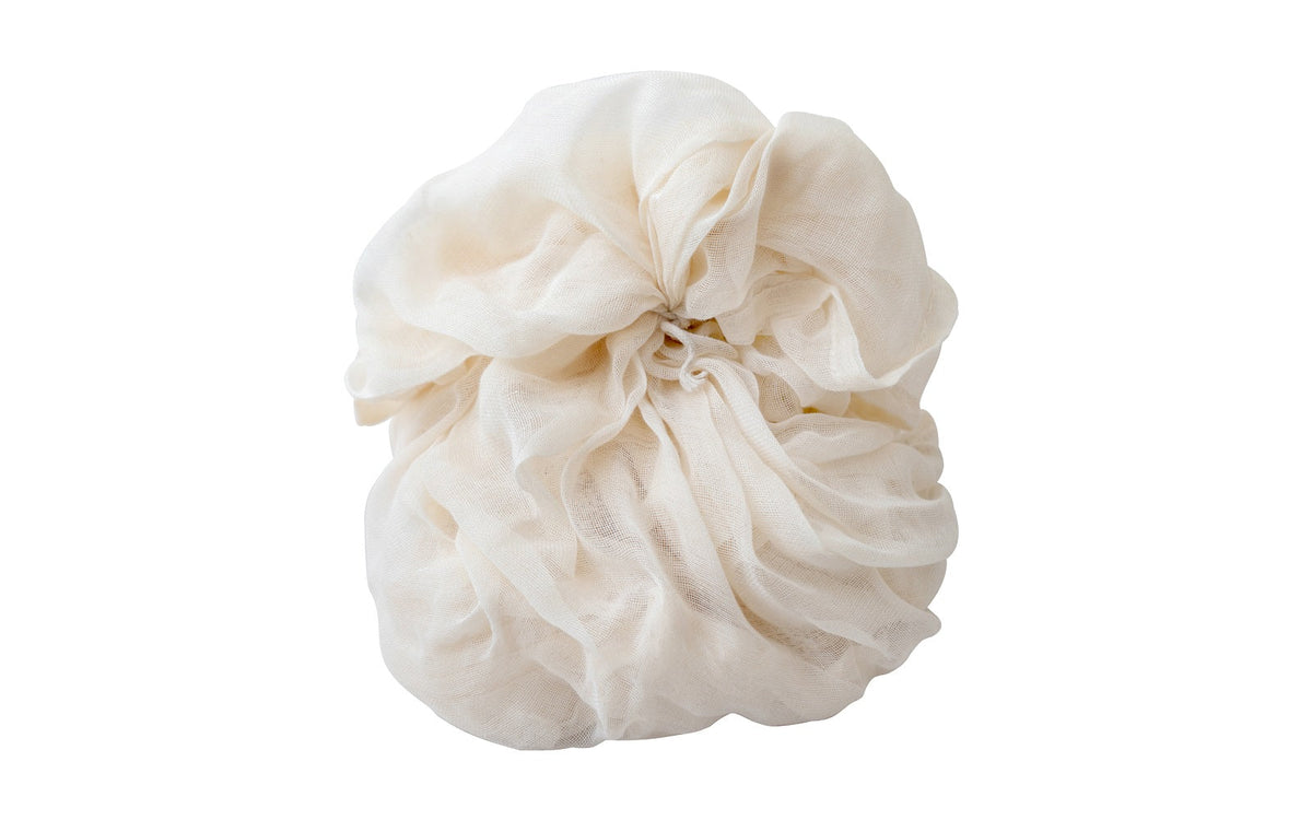 Natural cotton cheesecloth loosely gathered on a white background; select the one-sheet or four-sheet pack.