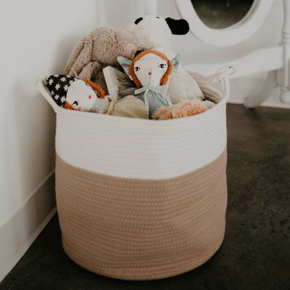 Cream and beige rope basket filled with stuffed toys; toys are not included.