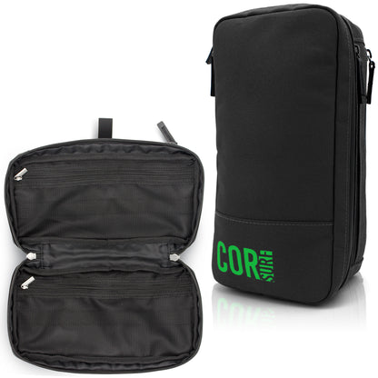 Black COR Surf toiletry bag shown closed and open with empty interior compartments.