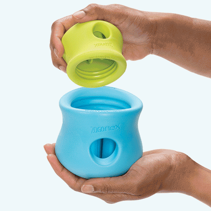 Animated demonstration of a Granny Smith Toppl fitting into an Aqua Blue Toppl; two toys are shown and sold separately.