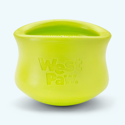 Granny Smith West Paw Toppl treat toy shown alone, with its top and side openings visible.