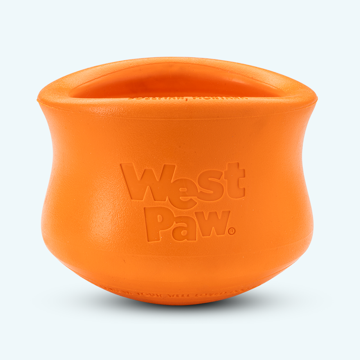 Tangerine West Paw Toppl treat toy shown alone, with its top opening visible.