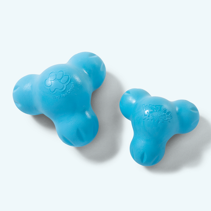 Two Aqua Blue West Paw Tux treat toys showing their rounded lobes and treat cavities; one toy is included per purchase.