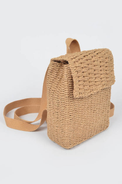 Side view of khaki woven cotton mini backpack