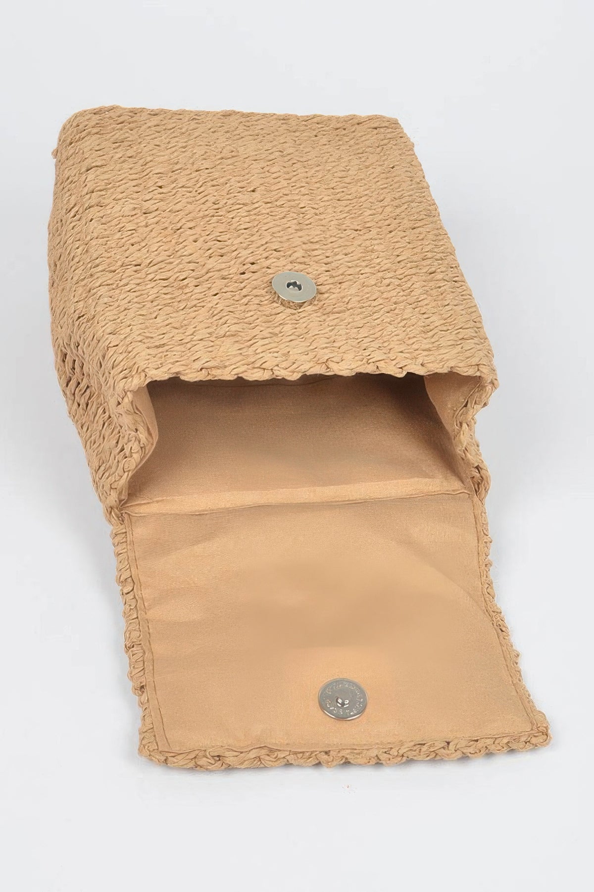 Open flap and inside of khaki woven cotton mini backpack