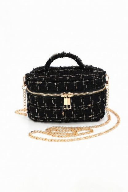 Black tweed vanity bag with top handle and detachable gold-tone chain strap