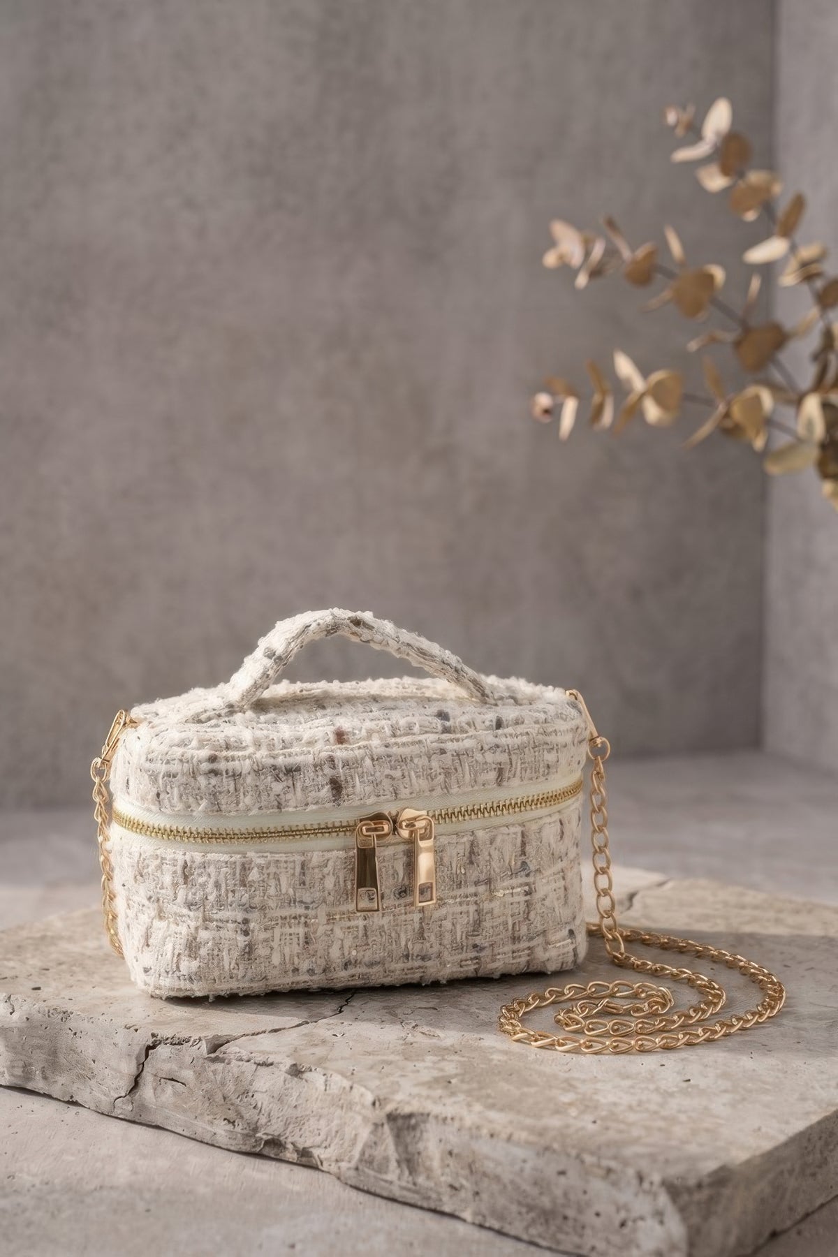 Ivory tweed vanity bag with top handle and detachable gold-tone chain
