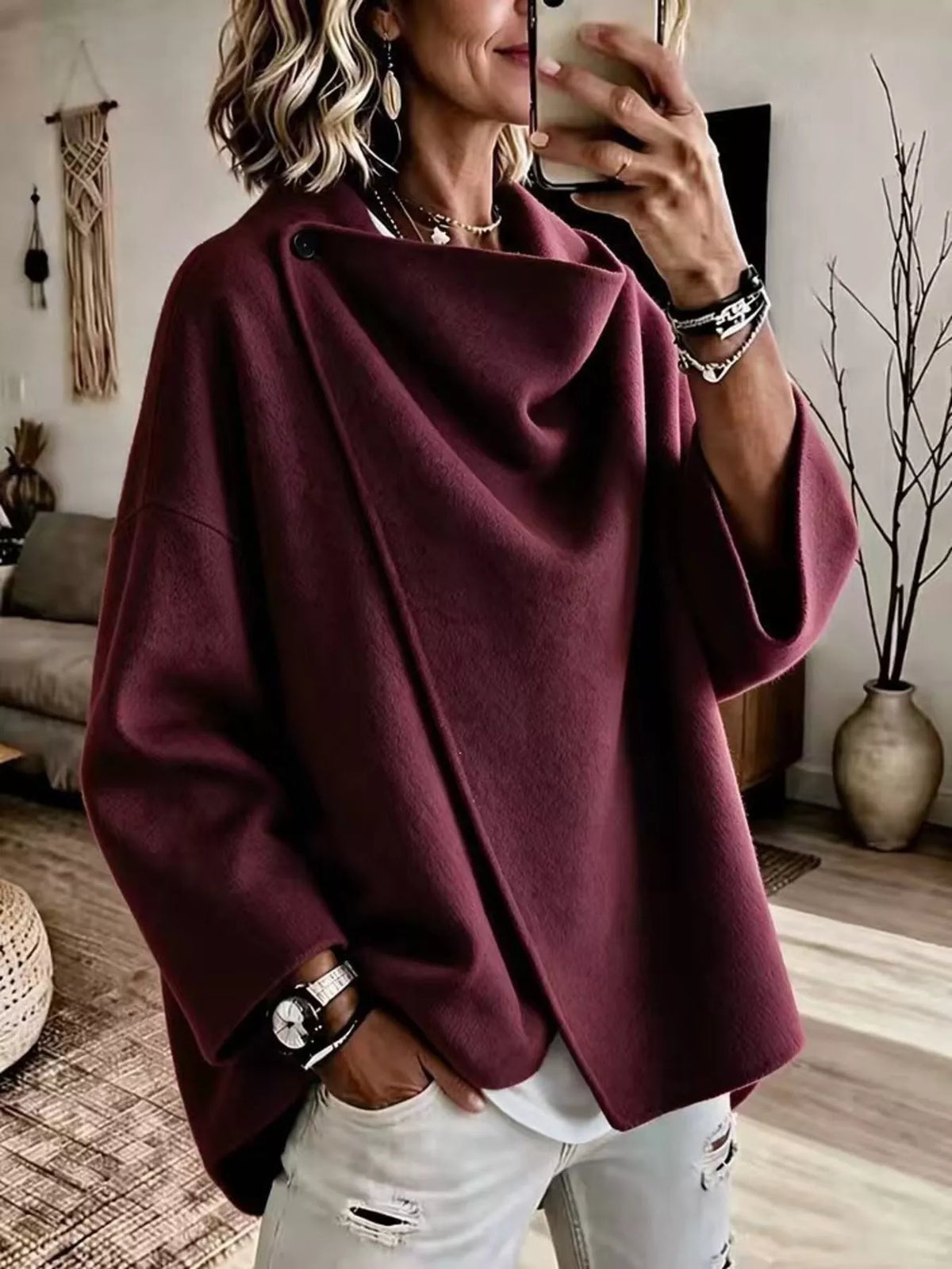 Burgundy asymmetric cowl-neck cape, modeled front view; one cape included