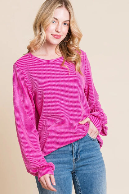 Fuchsia ribbed long-sleeve top with a round neck, front view