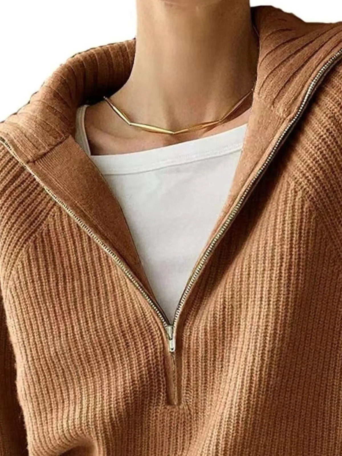 Half-zip long-sleeve ribbed sweater with a high collar.