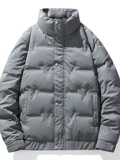 Gray men's puffer jacket, garment-only front view showing horizontal padded sections and side pockets.