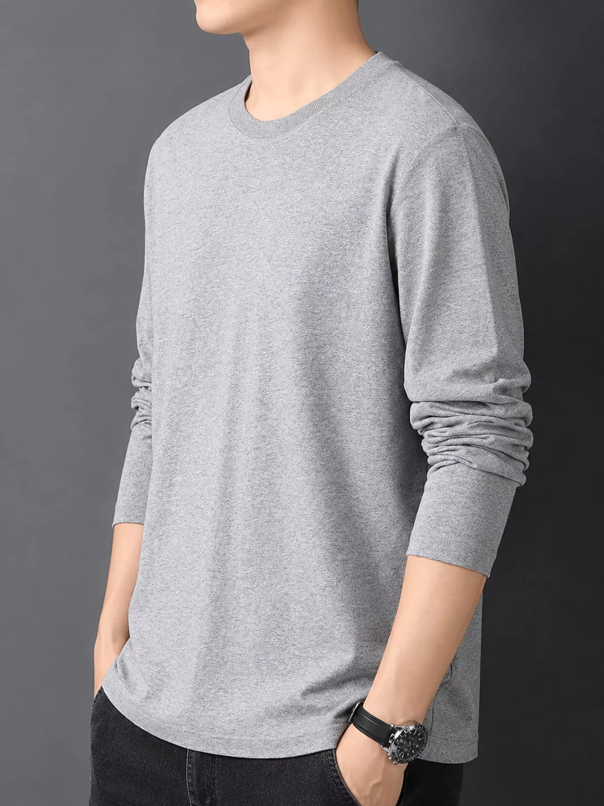 Gray men's cotton long-sleeve crewneck tee, side view.
