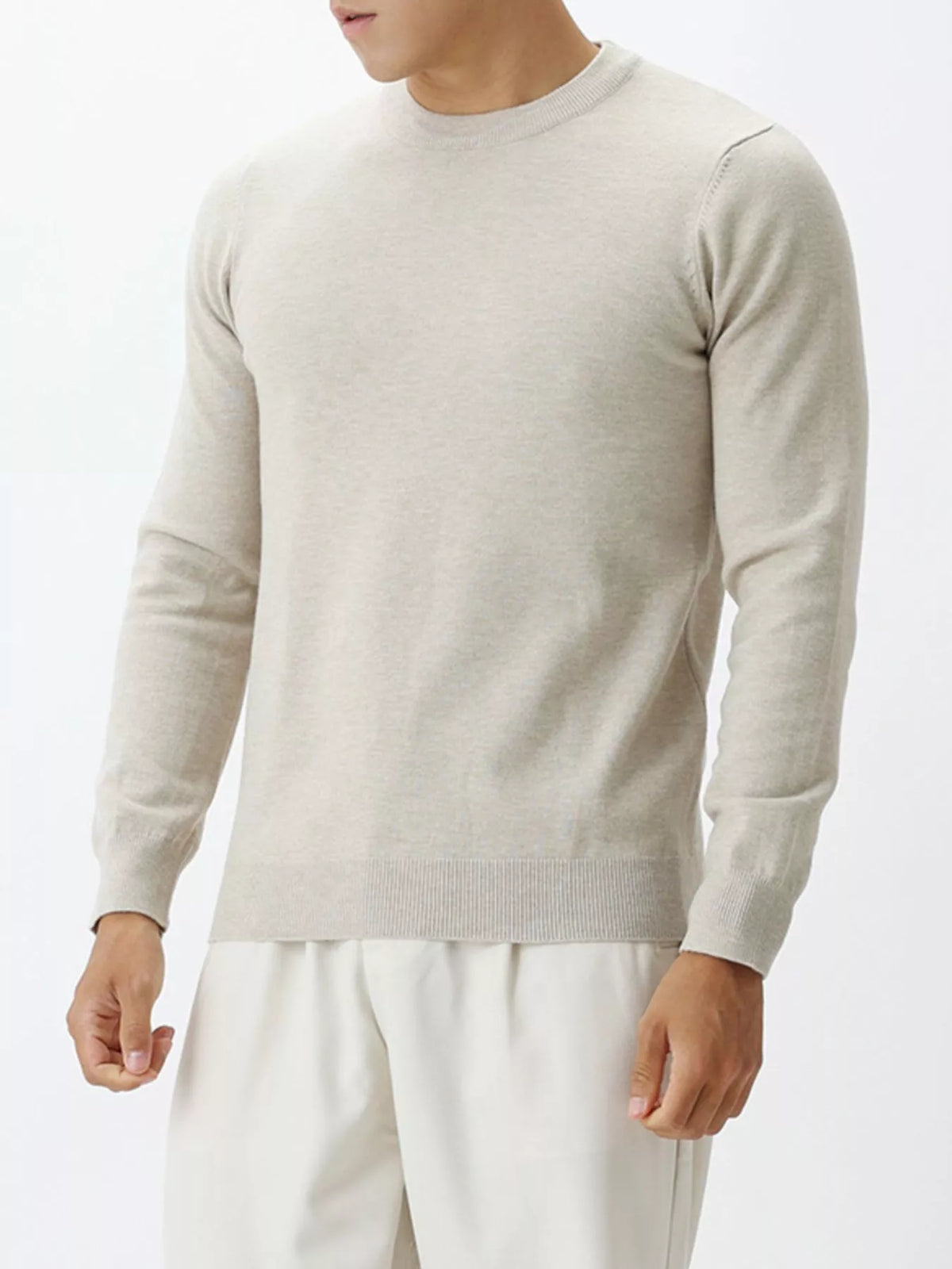 Men's long-sleeve crew-neck sweater in Apricot, side view.