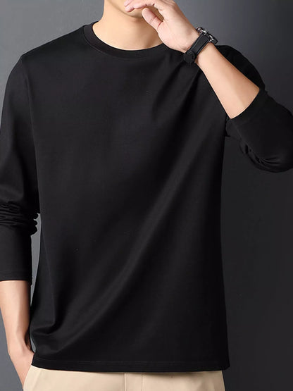 Black men's cotton long-sleeve crewneck tee, front view.