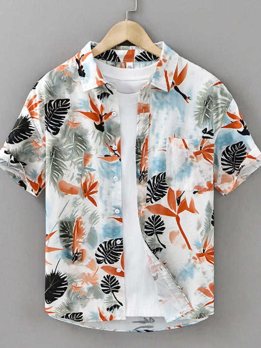 Multicolor botanical print short-sleeve button-up shirt, front view over a white undershirt