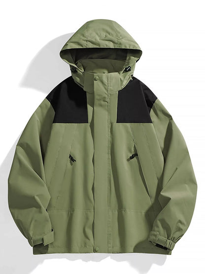Green windbreaker with black shoulder panels, front view.