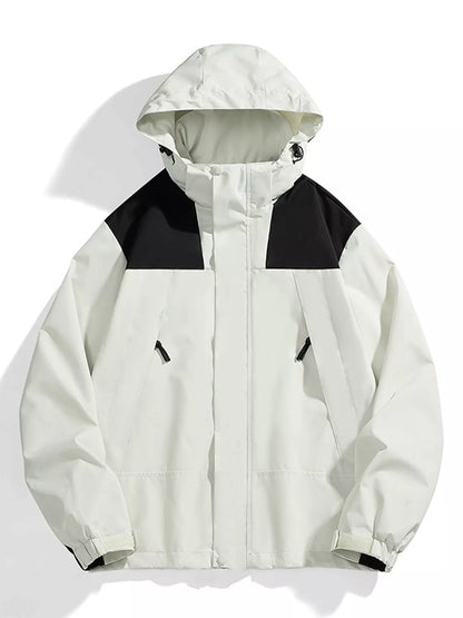 Ivory windbreaker with black shoulder panels, front view.