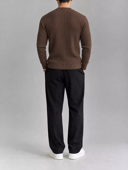 Coffee-colour ribbed knit top, modelled rear view. Trousers and shoes are not included.
