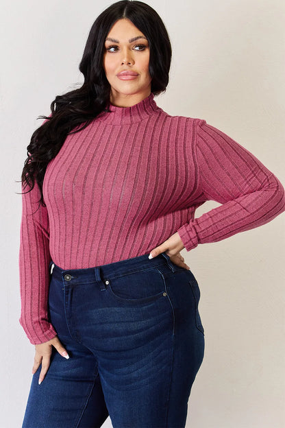 Hot Pink ribbed mock-neck long-sleeve top, product view; one top included, jeans and accessories excluded