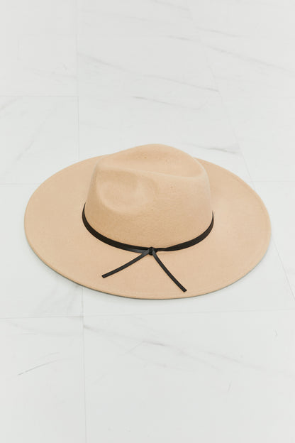 Beige Fame fedora hat with a black knotted faux-leather band, front view