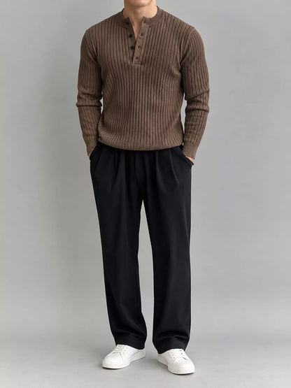 Coffee-colour ribbed long-sleeve knit top with button detailing, modelled front view. One top only; styling pieces not included.