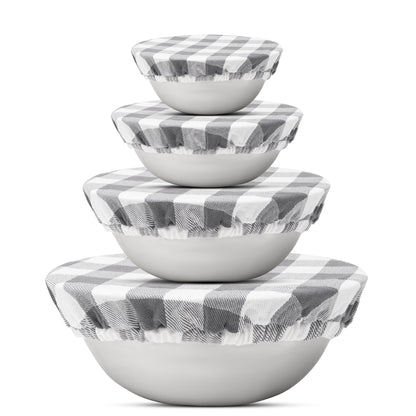 Four gray and white checked cloth covers on graduated bowls