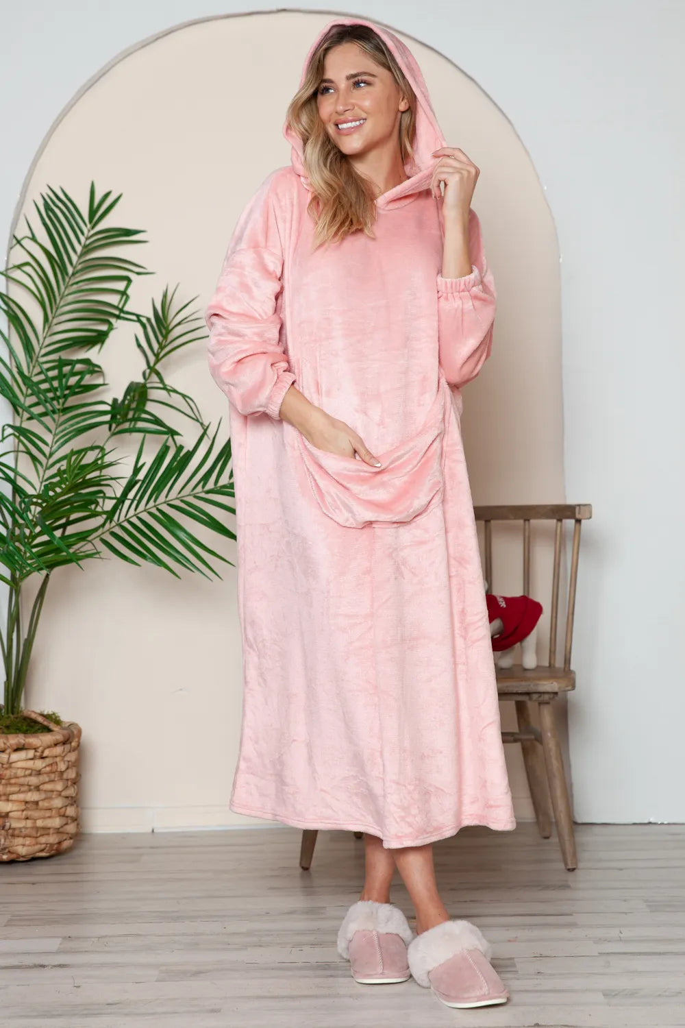 Dusty Pink hooded midi lounge dress with long sleeves and front kangaroo pocket, front or angled view. One dress; styling accessories not included.