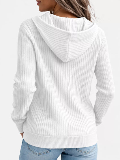 Back view of the white ribbed zip-front hooded cardigan with long sleeves.