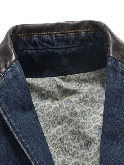 Close-up of the blazer's lapel, dark collar trim, contrast stitching and patterned lining.