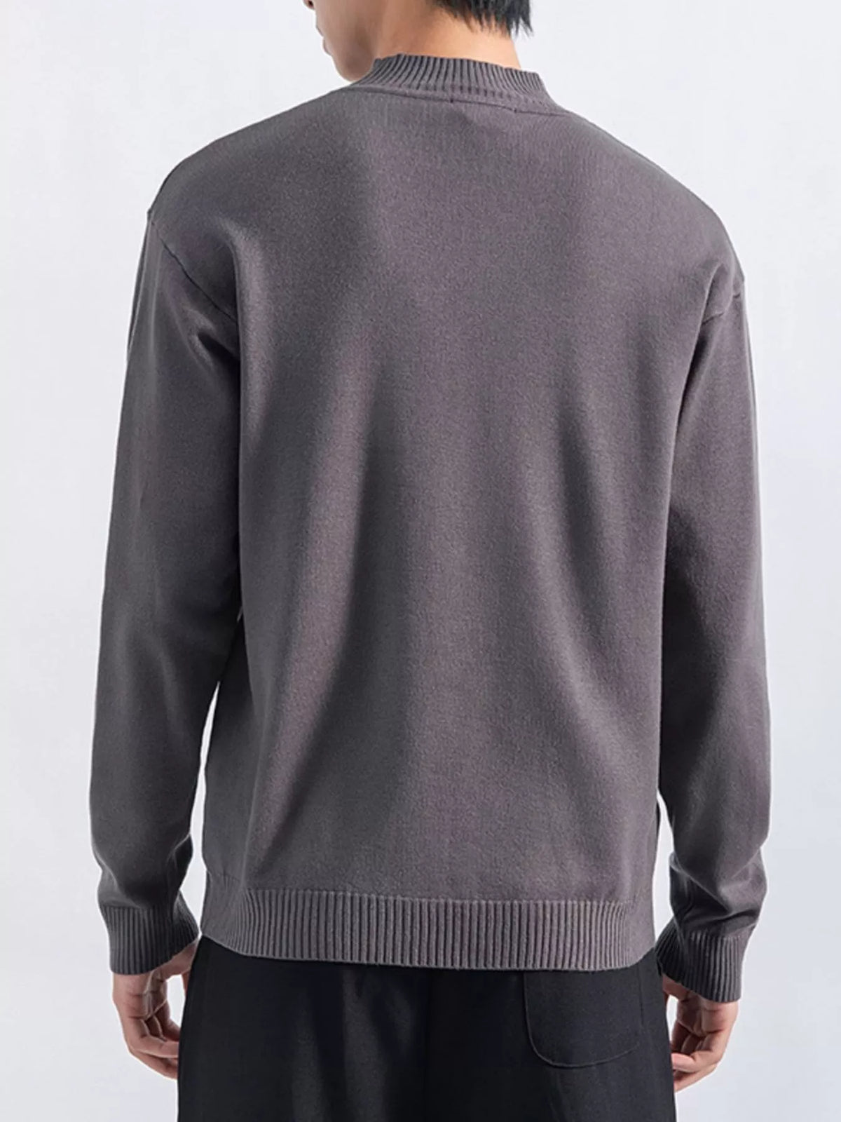 Men's Dark Gray minimalist mock-neck sweater, back view. Trousers are styling items and are not included.