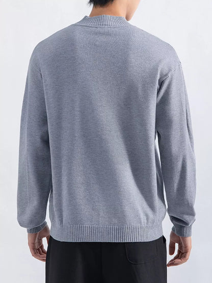 Men's Gray minimalist mock-neck sweater, back view. Trousers are styling items and are not included.