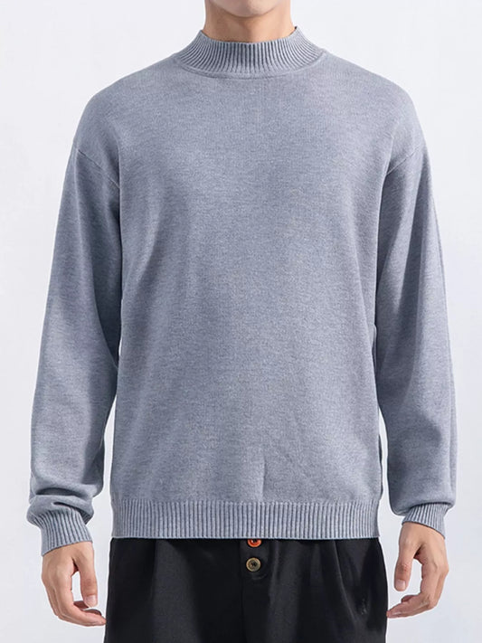 Men's Gray minimalist mock-neck sweater, front view. Trousers are styling items and are not included.
