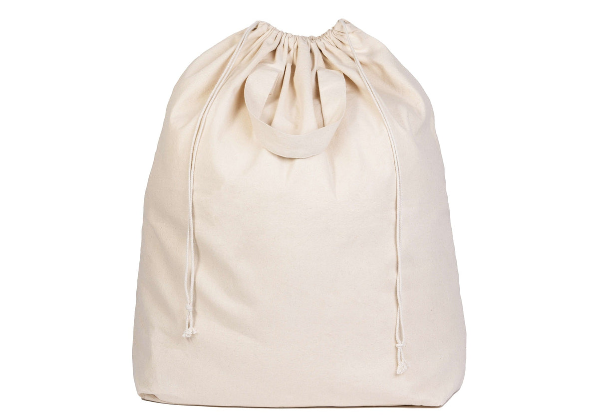 Cotton canvas laundry bag with drawstring closed and carrying handles