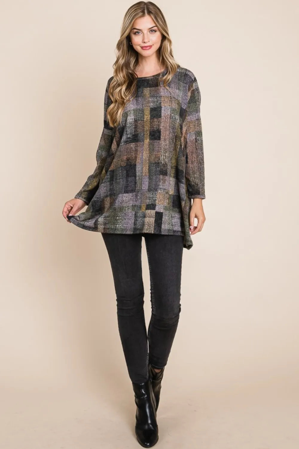 Full-length styling view of the BOMBOM plaid top; trousers and boots not included