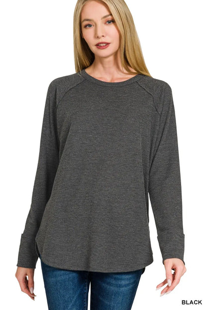 Black Zenana waffle-knit top, front view showing long raglan sleeves