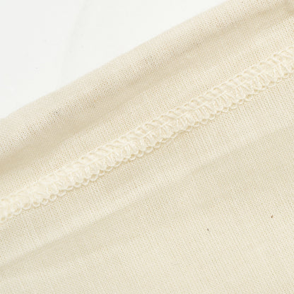 Close-up of cotton straining bag stitching