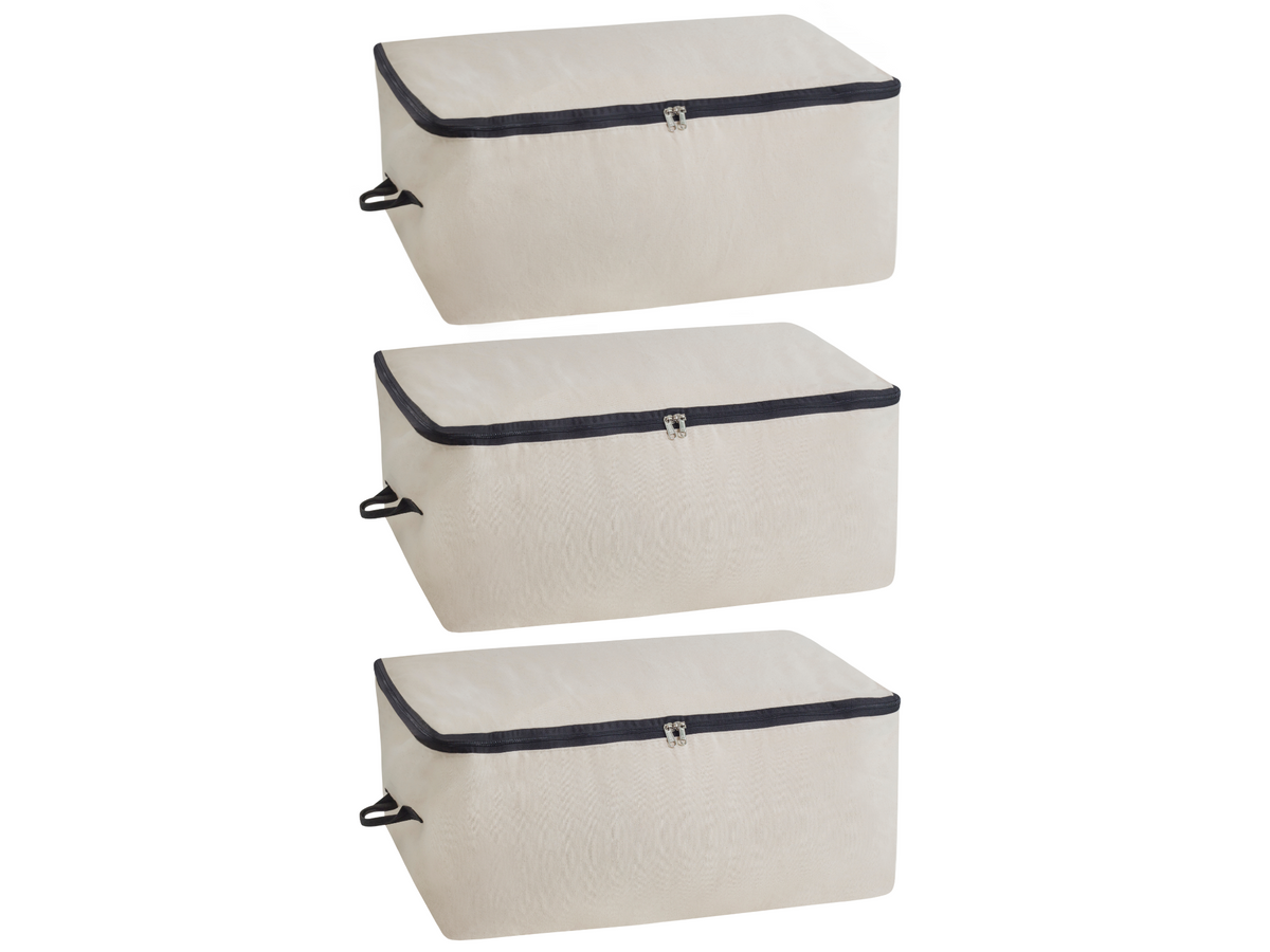 Three natural canvas comforter storage bags with zippers and side handles