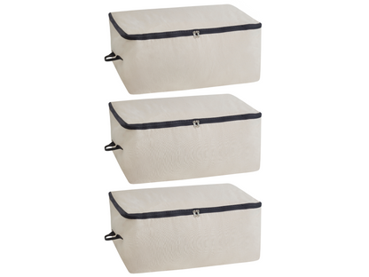 Three natural canvas comforter storage bags with zippers and side handles
